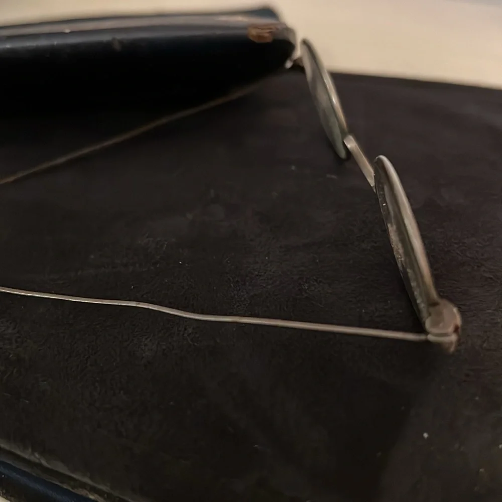 Antique metal wire rimmed eyeglasses and case